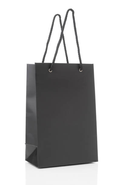 istock Black shopping bag on white background 667809484
