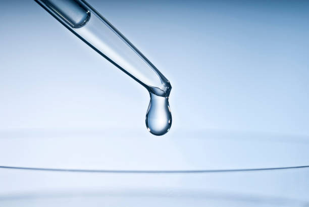 Pipette with drops stock photo