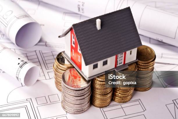 House On Stacks With Coins Stock Photo - Download Image Now - Prosperity, Detached House, Buying