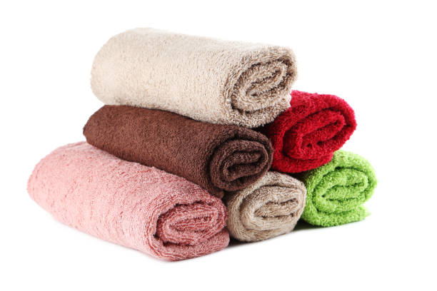 istock Rolled up towels isolated on a white background 667812790