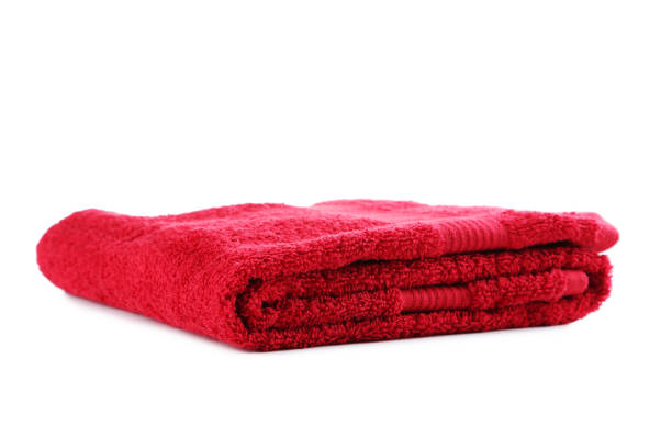 istock Red towel isolated on a white background 667812932