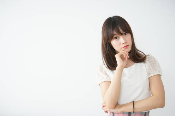 istock Young woman troubled with something 667813174