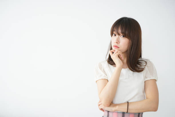 istock Young woman troubled with something 667813182