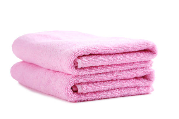 istock Pink towel isolated on a white background 667813204