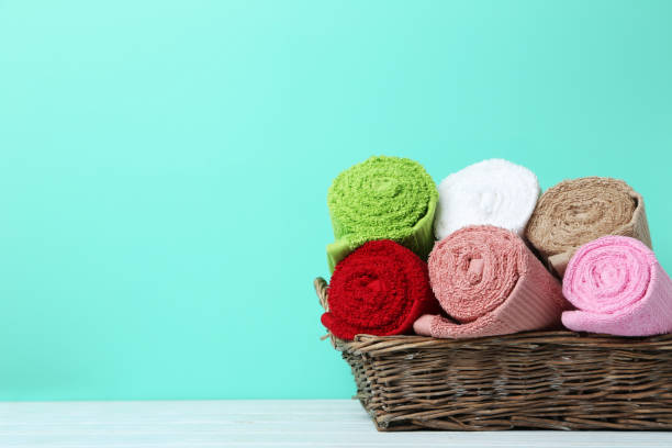 istock Towels in basket on green background 667816134