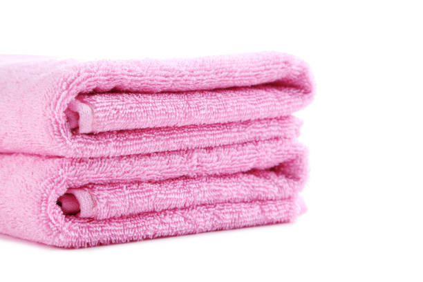 istock Pink towel isolated on a white background 667816398