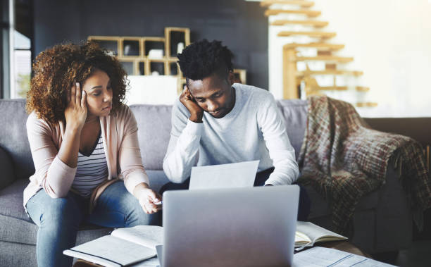 istock How are we going to pay all these overdue bills? 667816602
