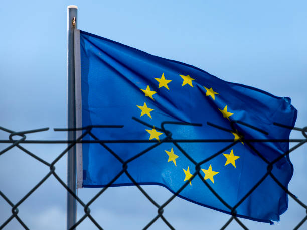 istock EU Flag and fence, concept picture 667823268