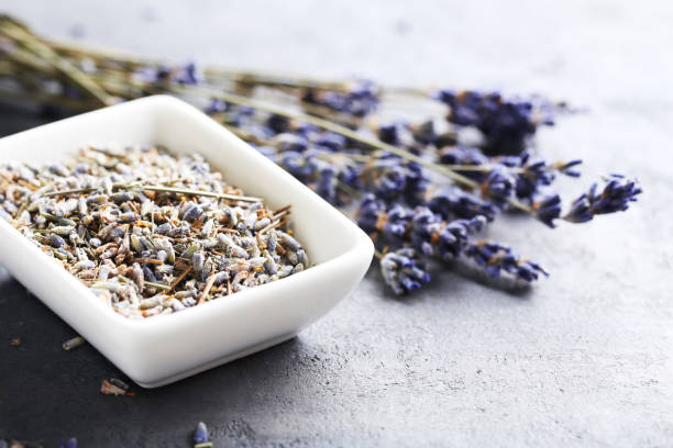 istock Lavender flowers in bowl on grey table 667824068