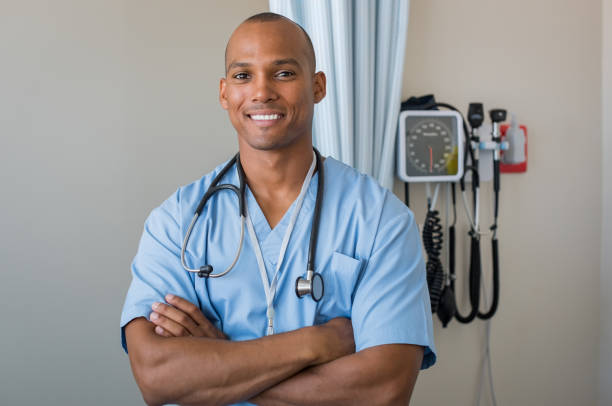 istock Happy nurse smiling 667831616