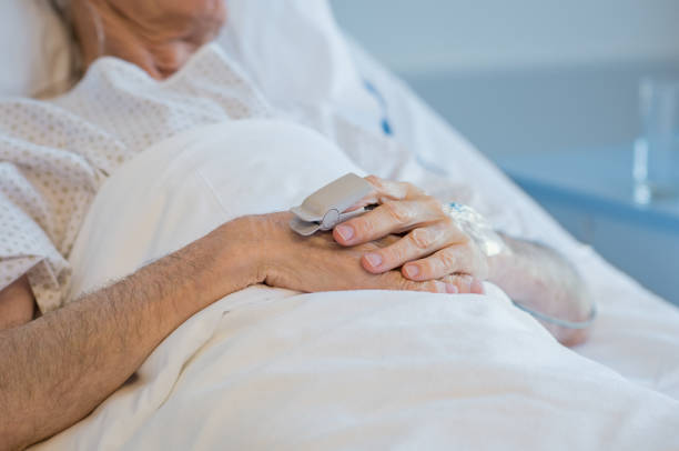 istock Hands of senior patient 667831774