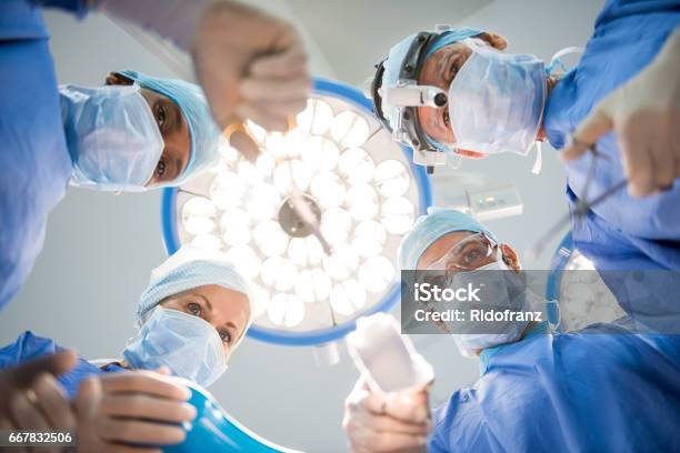 Team Of Surgeons Operating Stock Photo - Download Image Now - Emergency Room, Doctor, Medical Student