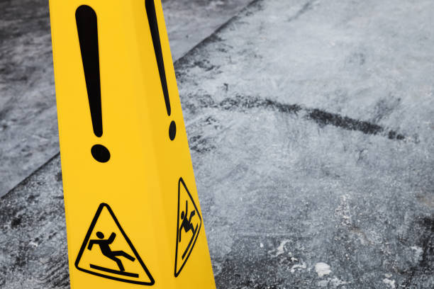 istock Caution wet floor, yellow warning sign fragment 667832510