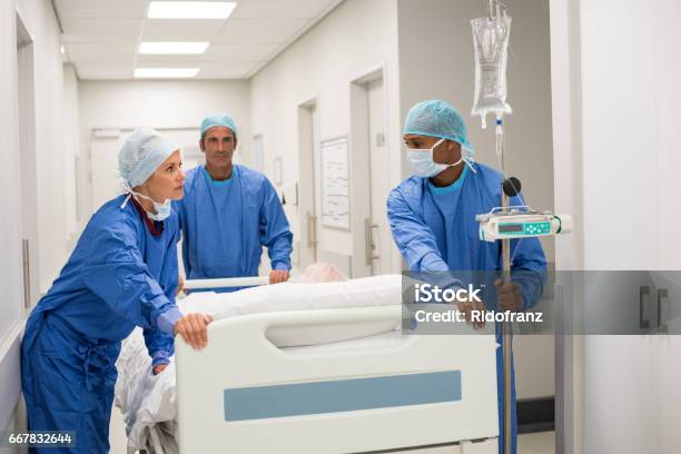 Urgent Patient In Hospital Stock Photo - Download Image Now - Emergency Medicine, Hospital, Nurse