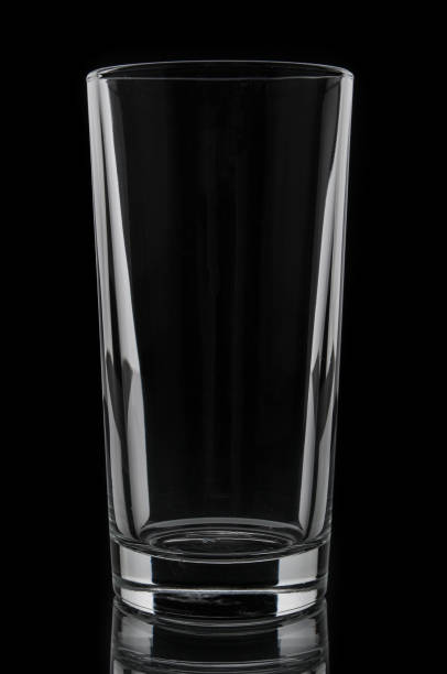 istock Glass tumbler on black background 667834998