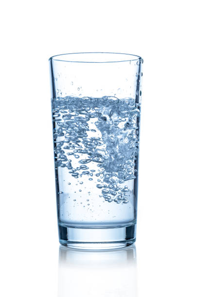 istock Glass with water on white background 667835160