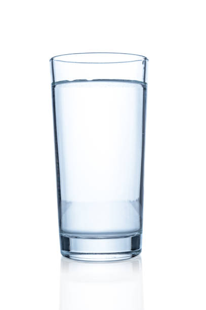 istock Glass with water on white background 667835386