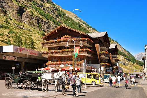 Zermatt, Switzerland - August 24, 2016: Tourists at City center in Zermatt, in Valais canton in Switzerland in summer.