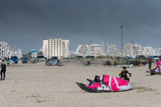 La Grande Motte,France,4 La Grande Motte, France - May 22, 2014:A group of surfers training in the Mediterranean Sea casa in affitto stock pictures, royalty-free photos & images