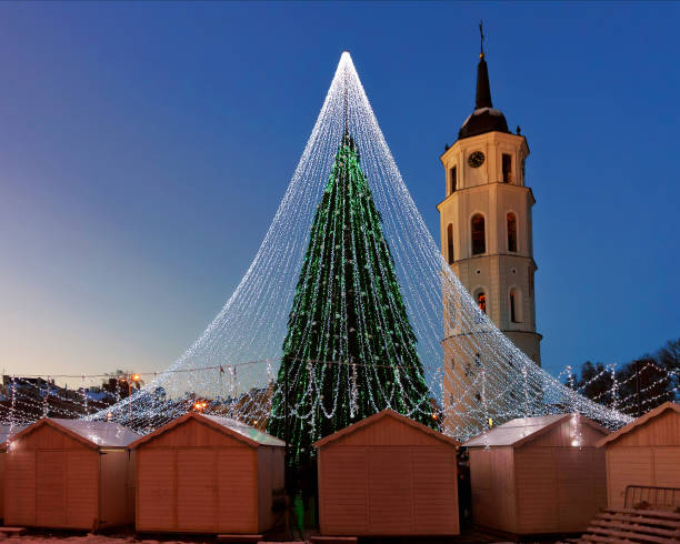 istock Christmas tree with decoration and Xmas stalls at Cathedral Square 667858026