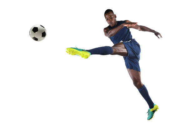 istock African AmericanSoccer Player Kicking Ball 667870494