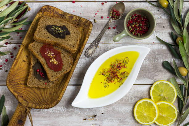 istock Bread slices, olive oil flat lay shot 667873678