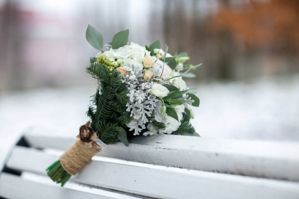 istock wedding bouquet on a light background. Winter bouquet 667873996