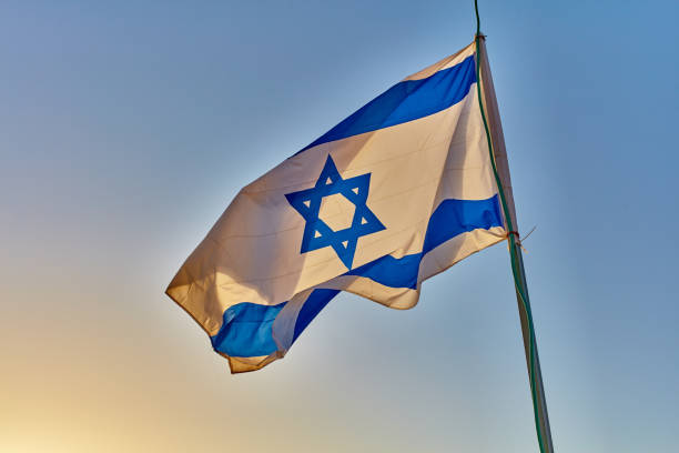 istock Israel flag at sunset 667879160
