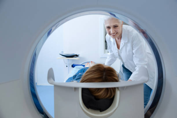 istock Cheerful friendly doctor preparing a patient to examination 667884320