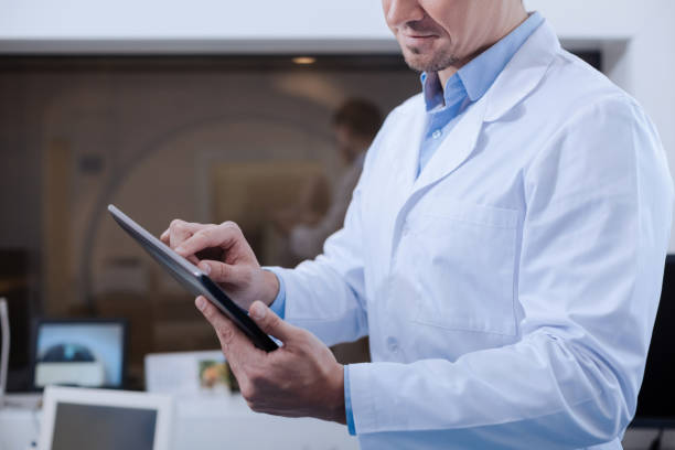 istock Modern tablet being used by a doctor 667892504