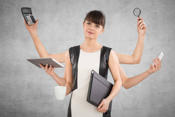 istock Multitask business woman with many hands. 667894736