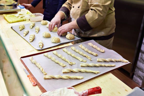 istock Cook prepares confectionery for baking 667895124