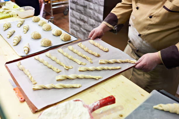 istock Cook prepares confectionery for baking 667895268