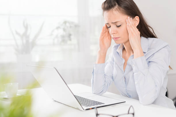 istock Young woman is tired and feels stressed out. 667895370