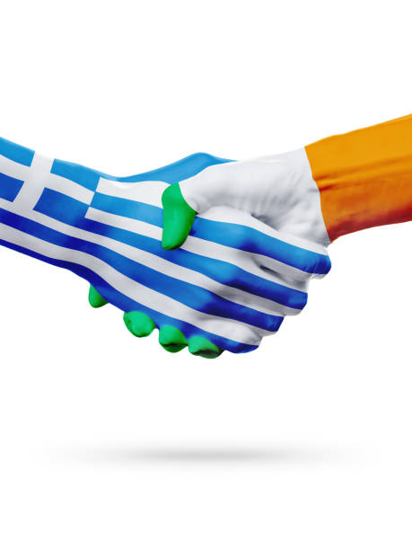 istock Flags Greece, Ireland countries, partnership friendship handshake concept. 667903562