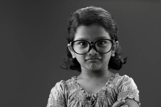 istock girl with big spectacles 667904688