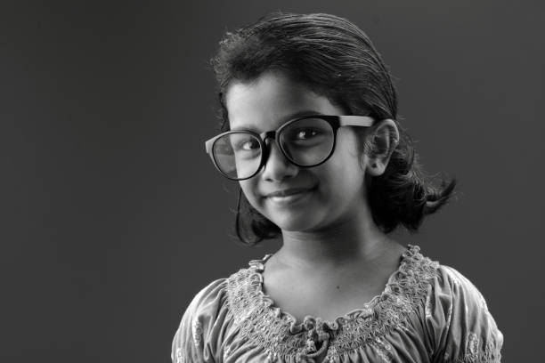 istock girl with big spectacles 667904730