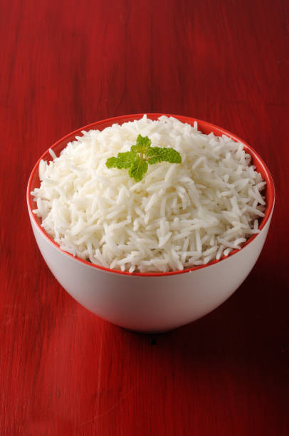 basmati rice in a brass bowl, cooked basmati rice,