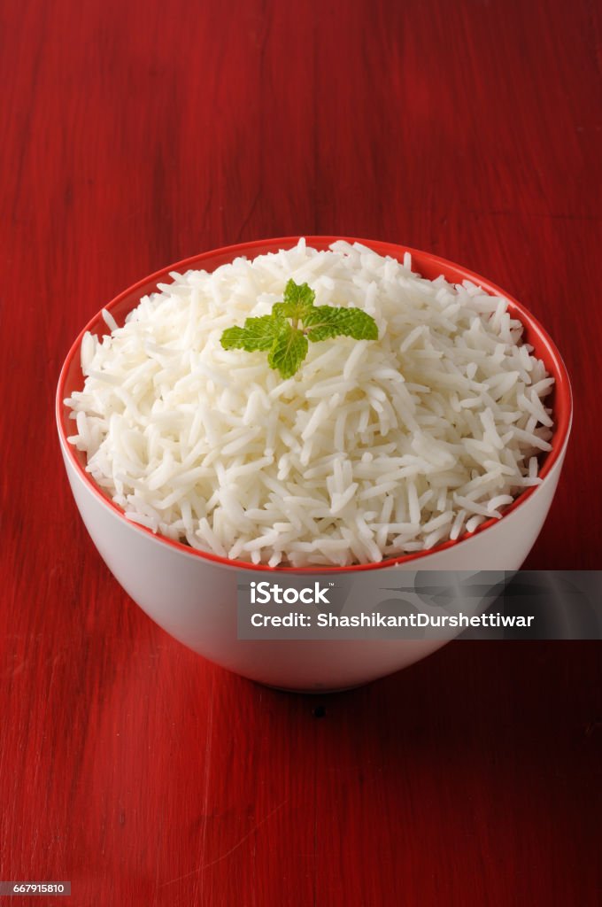 basmati rice in a brass bowl, cooked basmati rice, Rice - Food Staple Stock Photo