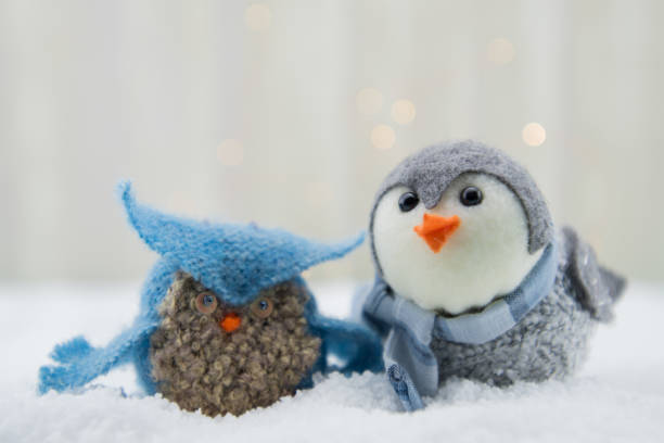 istock Felt Owl and Bird in Snow 667926620