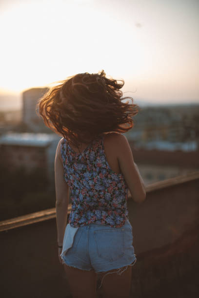 istock Girl on the rooftop 667940216