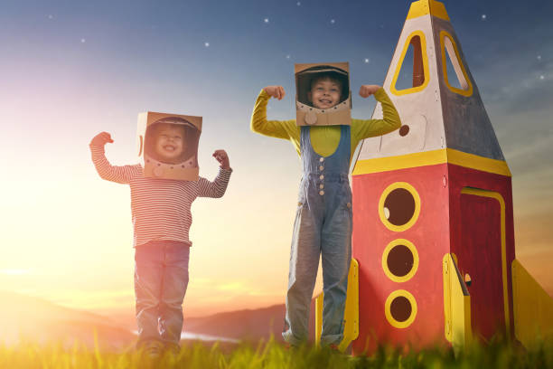 istock Children in astronauts costumes 667940256