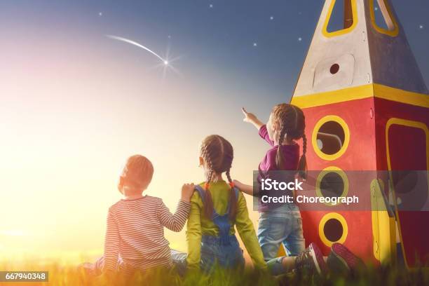 Kids Looking At The Sky Stock Photo - Download Image Now - Child, Outer Space, Adventure