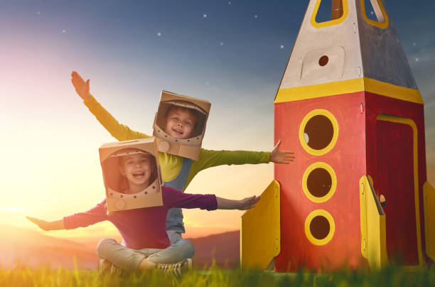 istock Children in astronauts costumes 667940366