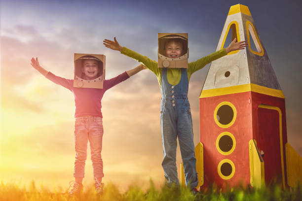 istock Children in astronauts costumes 667940396