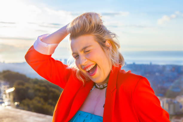 istock Young attractive woman smiling in Barcelona's sightseeing place 667945734