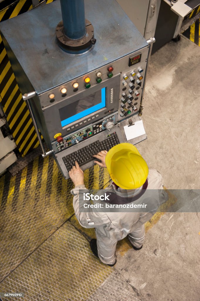 Factory Worker Using Pc Factory Worker Using Computer To Operate Machine Stock Photo - Download ...