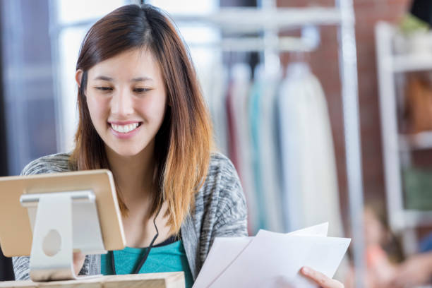 istock Cheerful clothing store manager 667947270