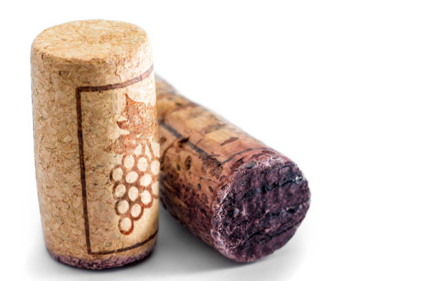 istock Close-up group of two wine cork bottle stopper in studio on white background with one old and one pretty new 667966610