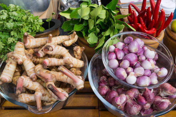 istock Tom Yam Kung ingredients, red onions, chili, galangal, kaffir lime, parsley 667977832